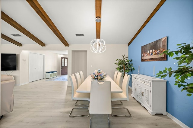 12131 NE 10th Ter, Ocala, FL 34479 - dining space with light wood-style floors and a chandelier
