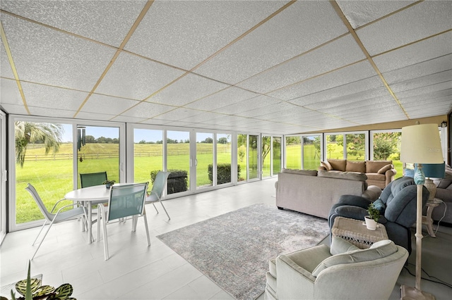12131 NE 10th Ter, Ocala, FL 34479 - sunroom / solarium with a wall of windows, a view of countryside, and tile patterned floors