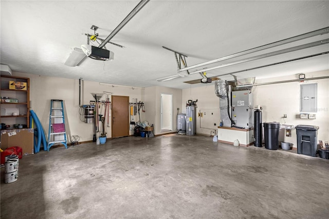 12131 NE 10th Ter, Ocala, FL 34479 - garage featuring a garage door opener, electric panel, heating unit, and electric water heater