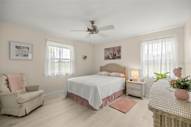 12131 NE 10th Ter, Ocala, FL 34479 - bedroom featuring light wood-style flooring and a ceiling fan