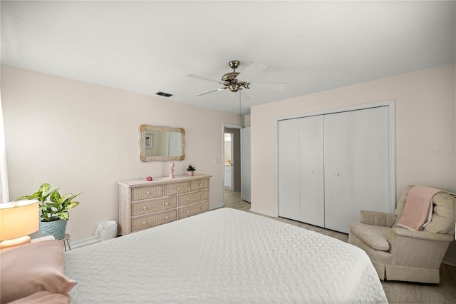 12131 NE 10th Ter, Ocala, FL 34479 - bedroom with a closet, light wood finished floors, and ceiling fan