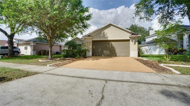 949 Woodsong Way, Clermont, FL 34714 - ranch-style home featuring stucco siding, a front lawn, and concrete driveway