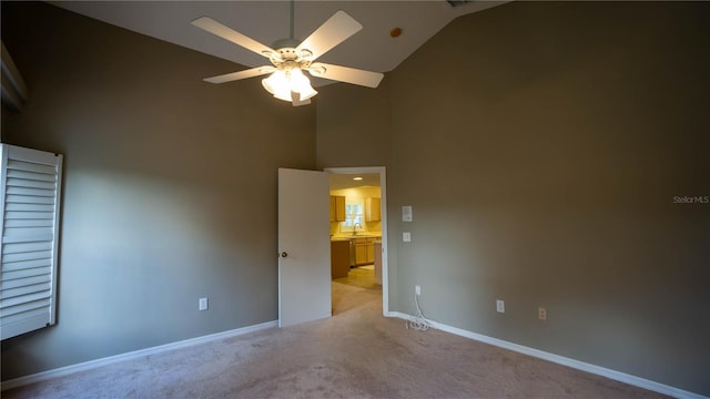 949 Woodsong Way, Clermont, FL 34714 - unfurnished room featuring high vaulted ceiling, light carpet, and a ceiling fan