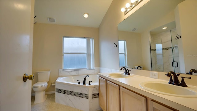 949 Woodsong Way, Clermont, FL 34714 - bathroom with a bath, a stall shower, double vanity, and tile patterned flooring