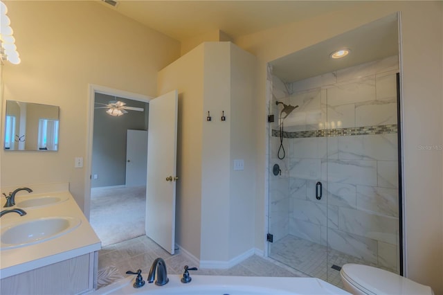 949 Woodsong Way, Clermont, FL 34714 - full bath with a shower stall, double vanity, and ceiling fan