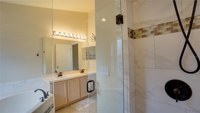 949 Woodsong Way, Clermont, FL 34714 - bathroom with a shower stall, a garden tub, double vanity, and tile patterned flooring
