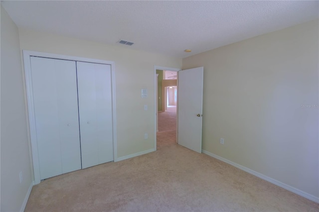 949 Woodsong Way, Clermont, FL 34714 - unfurnished bedroom with carpet floors and a closet