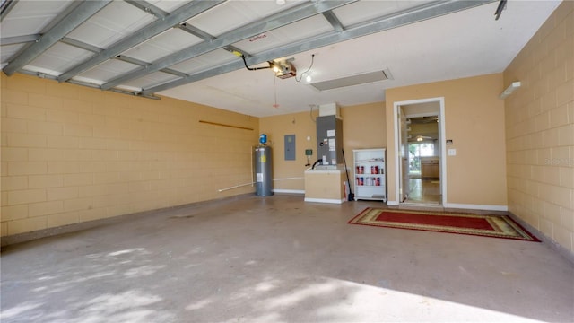 949 Woodsong Way, Clermont, FL 34714 - garage with electric panel, water heater, a garage door opener, heating unit, and concrete block wall