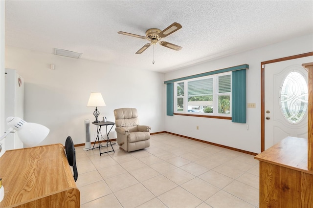 8247 SW 105th Pl, Ocala, FL 34481 - entrance foyer featuring a ceiling fan and a textured ceiling