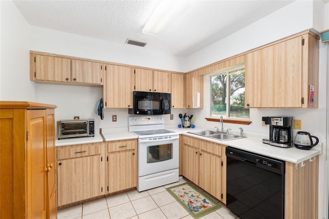 8247 SW 105th Pl, Ocala, FL 34481 - kitchen featuring black appliances, light brown cabinets, light countertops, light tile patterned flooring, and a textured ceiling