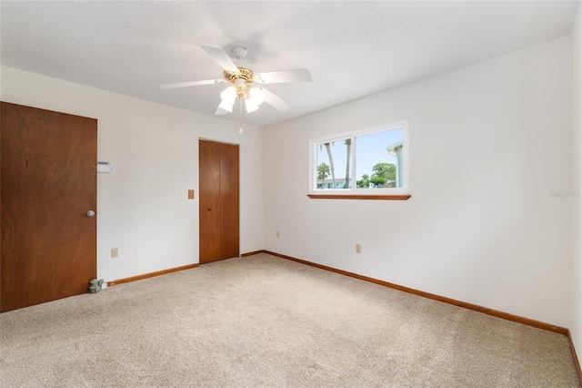 8247 SW 105th Pl, Ocala, FL 34481 - empty room featuring light carpet and ceiling fan