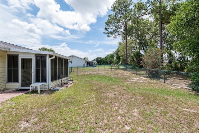 8247 SW 105th Pl, Ocala, FL 34481 - fenced backyard featuring a sunroom