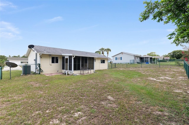8247 SW 105th Pl, Ocala, FL 34481 - back of house featuring a sunroom and a fenced backyard