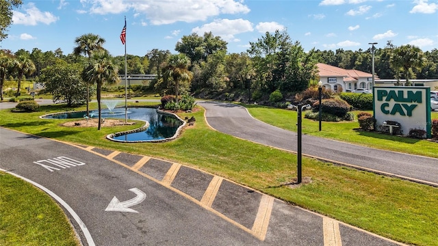8247 SW 105th Pl, Ocala, FL 34481 - view of asphalt street with view of wooded area
