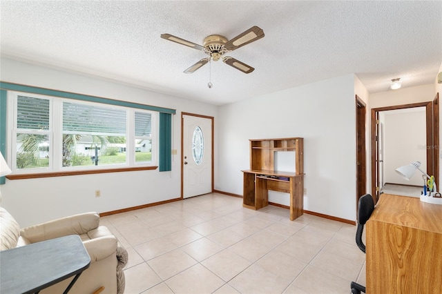 8247 SW 105th Pl, Ocala, FL 34481 - entrance foyer with ceiling fan, a textured ceiling, and light tile patterned flooring