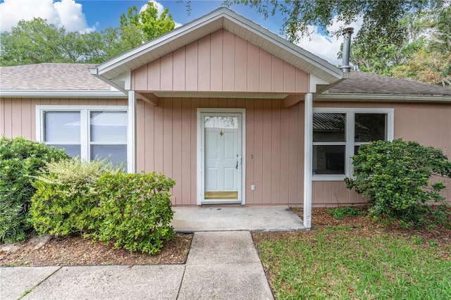 2864 SW 40th Ave, Gainesville, FL 32608 - doorway to property featuring a shingled roof