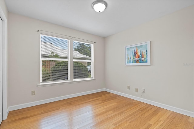 2864 SW 40th Ave, Gainesville, FL 32608 - spare room featuring light wood-type flooring and baseboards