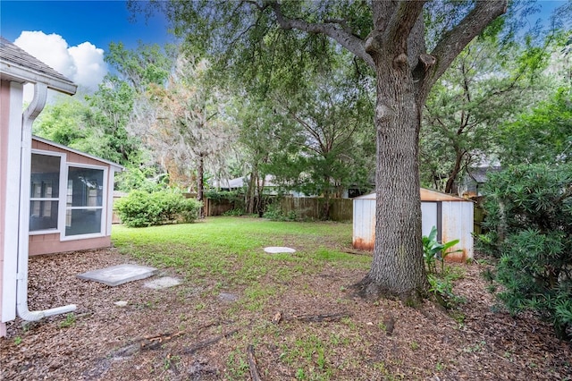 2864 SW 40th Ave, Gainesville, FL 32608 - fenced backyard featuring a storage shed