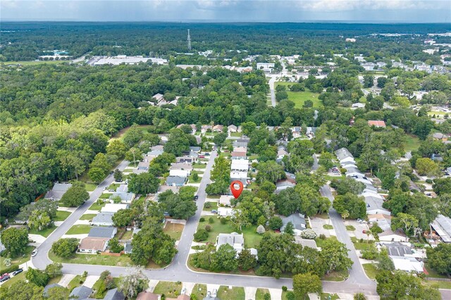 2864 SW 40th Ave, Gainesville, FL 32608 - aerial perspective of suburban area featuring a heavily wooded area