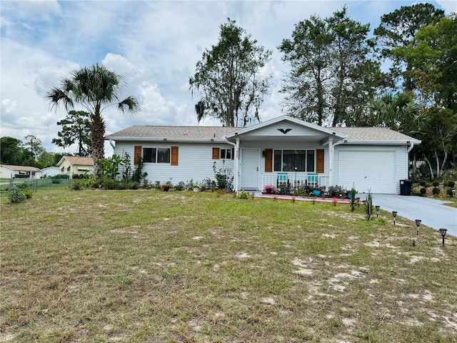 8547 SW 106th Pl, Ocala, FL 34481 - ranch-style home with a porch, an attached garage, and concrete driveway