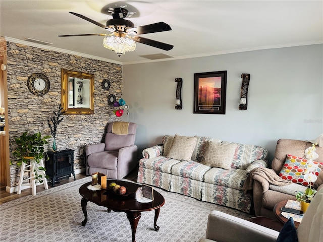 8547 SW 106th Pl, Ocala, FL 34481 - living room featuring ornamental molding, a ceiling fan, and a wood stove