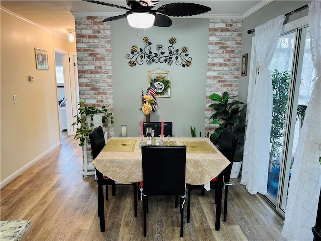 8547 SW 106th Pl, Ocala, FL 34481 - dining room with ornamental molding, wood finished floors, and ceiling fan