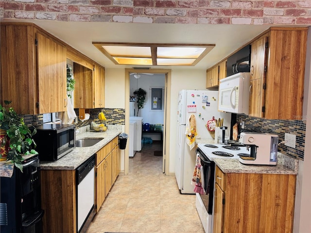 8547 SW 106th Pl, Ocala, FL 34481 - kitchen featuring white appliances, tasteful backsplash, and brown cabinets