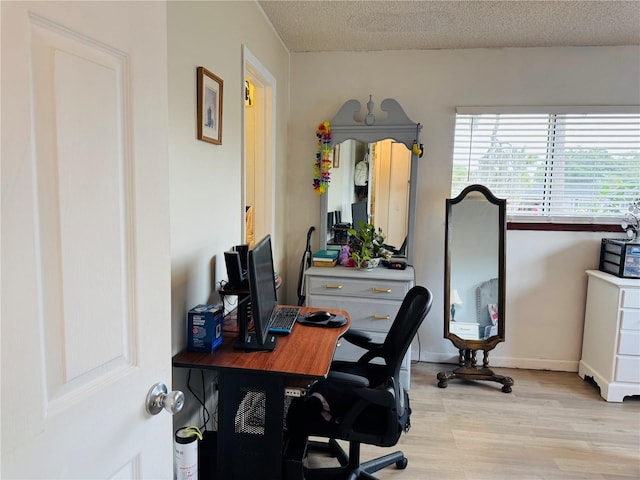 8547 SW 106th Pl, Ocala, FL 34481 - office area with light wood-type flooring and a textured ceiling