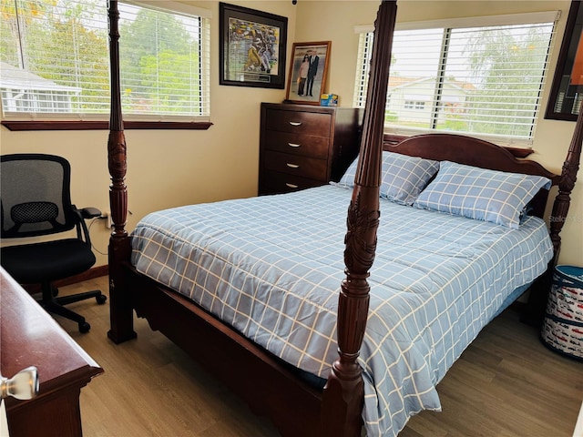 8547 SW 106th Pl, Ocala, FL 34481 - bedroom featuring wood finished floors