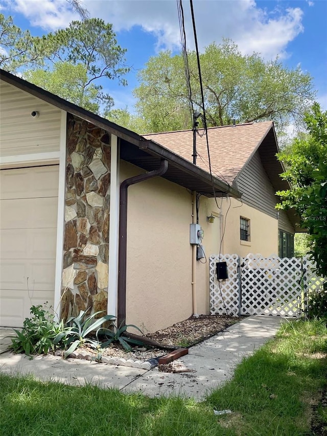 1112 NE 130th Ter, Silver Springs, FL 34488 - view of home's exterior with stucco siding and stone siding