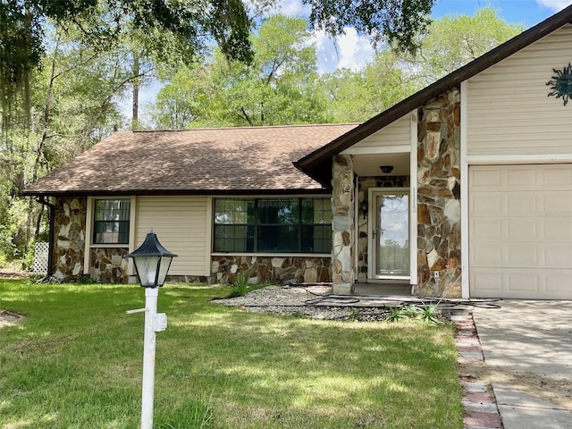 1112 NE 130th Ter, Silver Springs, FL 34488 - view of front of property with stone siding, a front lawn, a garage, a shingled roof, and concrete driveway