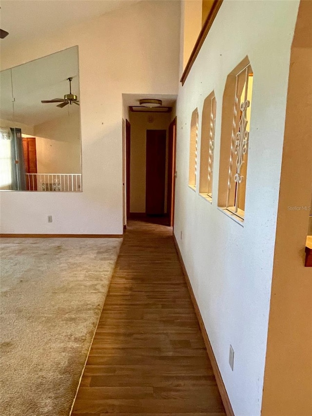 1112 NE 130th Ter, Silver Springs, FL 34488 - hallway featuring wood finished floors and baseboards
