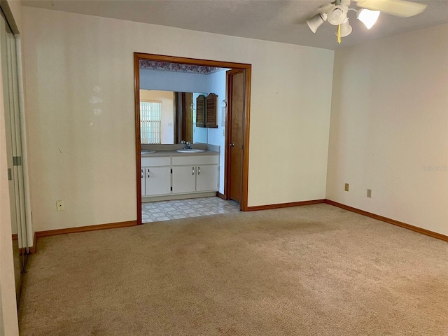 1112 NE 130th Ter, Silver Springs, FL 34488 - unfurnished room with light colored carpet and a ceiling fan