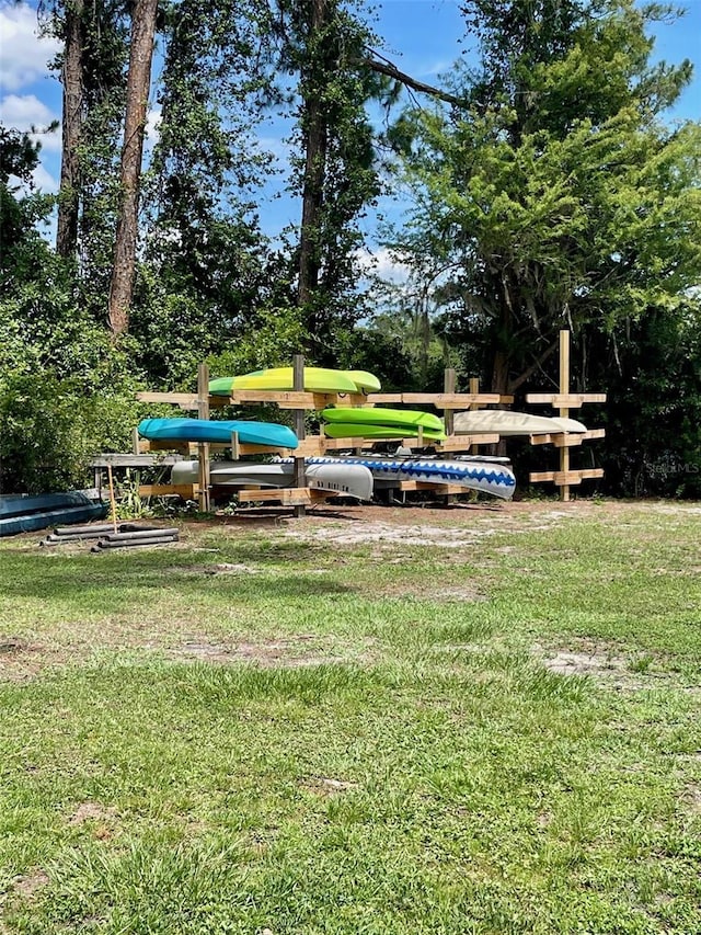 1112 NE 130th Ter, Silver Springs, FL 34488 - view of green lawn featuring view of scattered trees