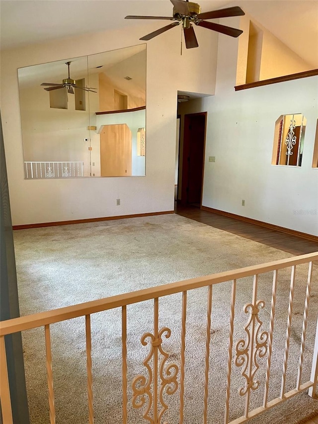 1112 NE 130th Ter, Silver Springs, FL 34488 - unfurnished living room with ceiling fan, carpet, and high vaulted ceiling