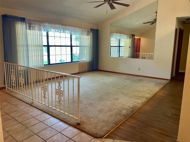 1112 NE 130th Ter, Silver Springs, FL 34488 - unfurnished room with a ceiling fan, vaulted ceiling, and wood finished floors