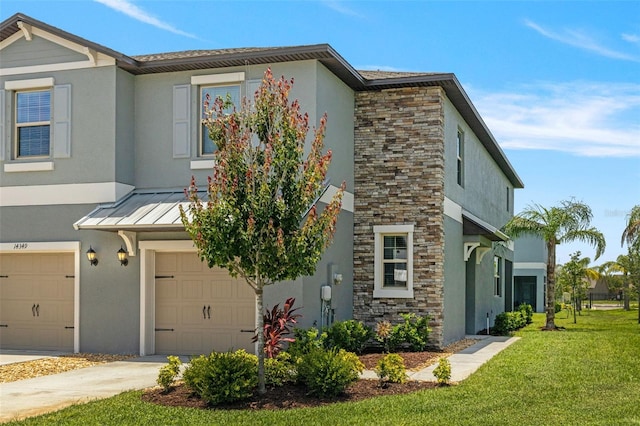 14347 Easy Goer St, Ruskin, FL 33573 - view of front of home featuring a garage, stucco siding, a front yard, and concrete driveway