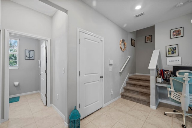 14347 Easy Goer St, Ruskin, FL 33573 - stairs with tile patterned floors and baseboards