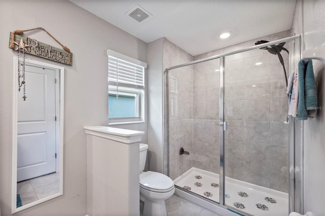 14347 Easy Goer St, Ruskin, FL 33573 - bathroom featuring a shower stall and tile patterned flooring