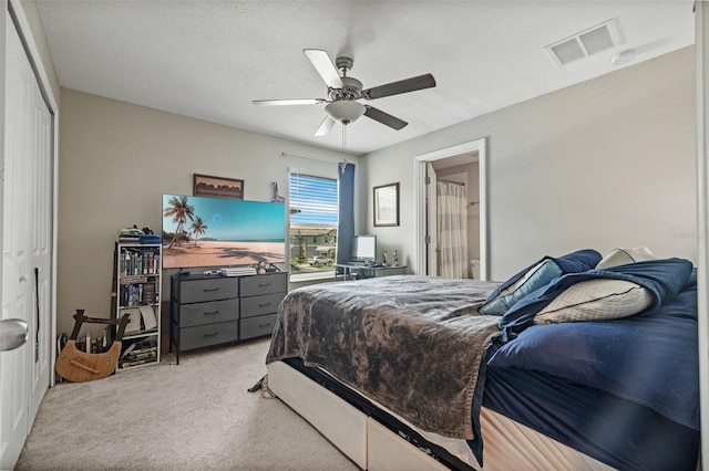 14347 Easy Goer St, Ruskin, FL 33573 - bedroom featuring light colored carpet and ceiling fan