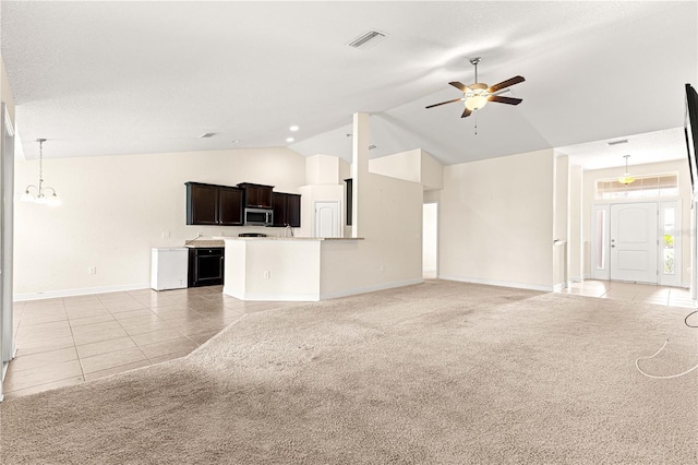 8 Diamond Club Rd, Ocala, FL 34472 - unfurnished living room featuring light tile patterned floors, a ceiling fan, light carpet, high vaulted ceiling, and a chandelier