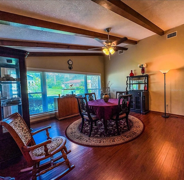 3545 SE 24th Ave, Ocala, FL 34471 - dining space with beamed ceiling, wood finished floors, ceiling fan, and a textured ceiling