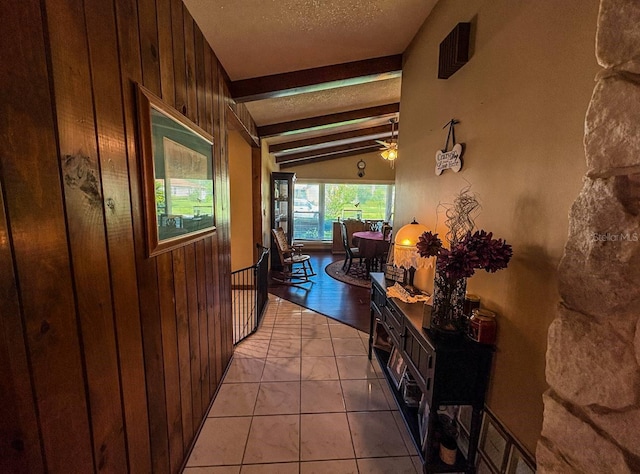 3545 SE 24th Ave, Ocala, FL 34471 - corridor featuring wooden walls and a textured ceiling
