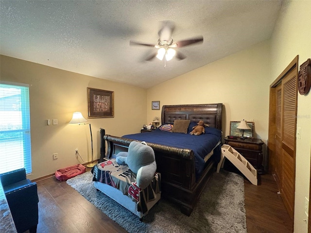 3545 SE 24th Ave, Ocala, FL 34471 - bedroom with vaulted ceiling, wood finished floors, a textured ceiling, ceiling fan, and a closet