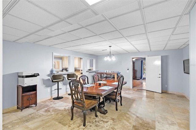 200 Asphodel Dr, Dothan, AL 36303 - dining area with a drop ceiling and a chandelier