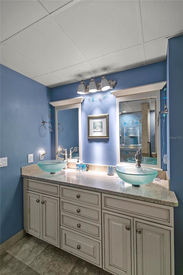200 Asphodel Dr, Dothan, AL 36303 - full bath featuring double vanity and baseboards