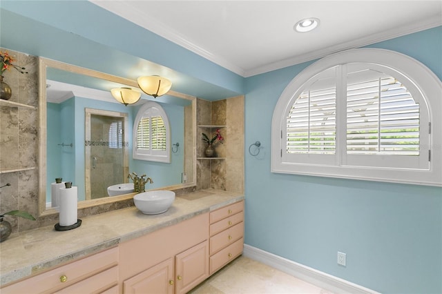 200 Asphodel Dr, Dothan, AL 36303 - bathroom featuring crown molding, vanity, tiled shower, and plenty of natural light