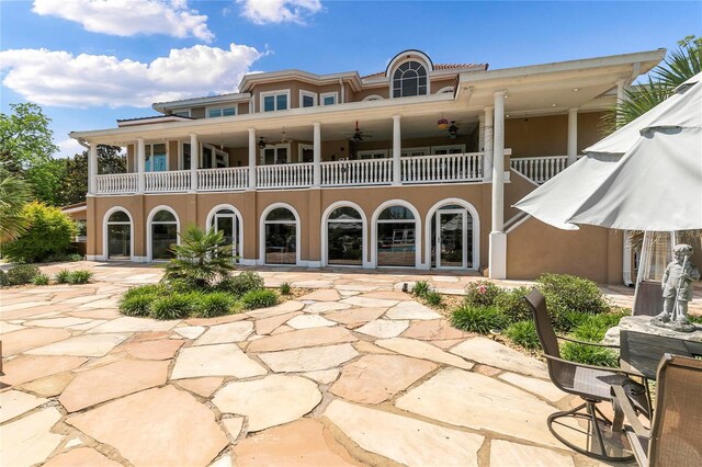 200 Asphodel Dr, Dothan, AL 36303 - rear view of house with a balcony, a patio area, and stucco siding