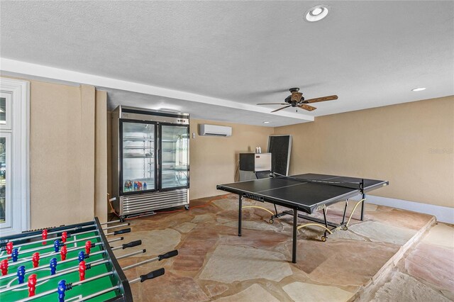 200 Asphodel Dr, Dothan, AL 36303 - game room with an AC wall unit, ceiling fan, and recessed lighting