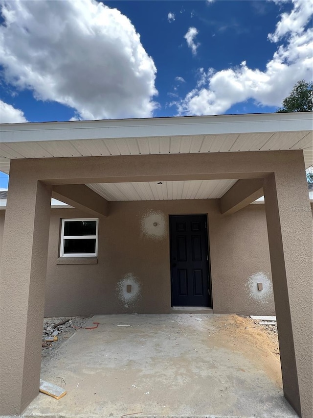 21712 SW Rainbow Lakes Blvd, Dunnellon, FL 34431 - entrance to property with stucco siding